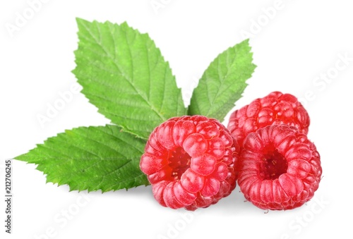 Rasberry with leaf on white background