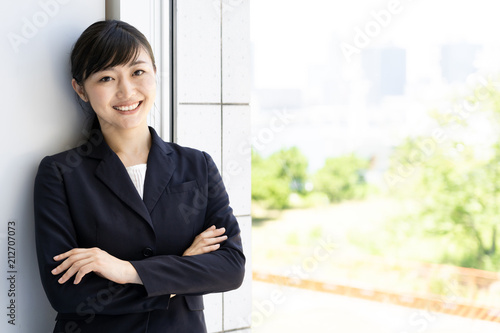 portrait of asian businesswoman relaxing © taka