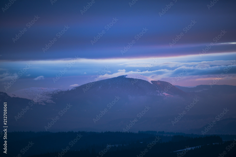 Winter landscape in Carpathian Mountains at the sunrise