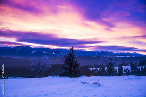 Winter landscape in Carpathian Mountains at the sunrise