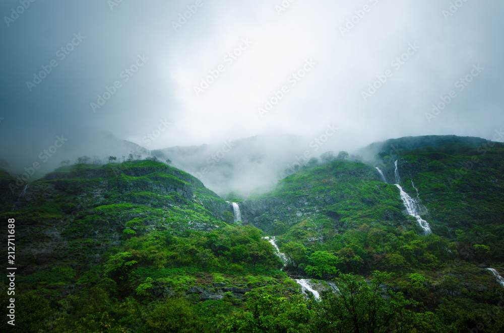 Rain forest in a middle of India. Beautiful green forest with rain. Waterfalls and amazing view from the road. Rain forest in a middle of India. Beautiful green forest with rain. Waterfalls and amazing view from the road.