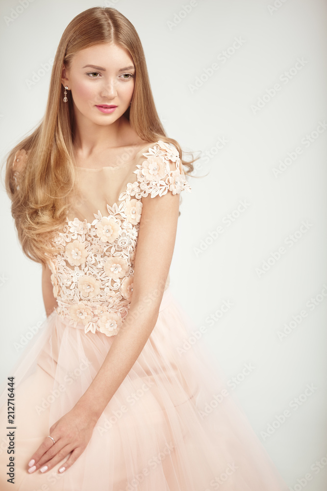 Beautiful Woman in Lace Wedding Dress. Beautiful Lady with Healthy and Beauty Hair Beautiful Woman in Lace Wedding Dress. Beautiful Lady with Healthy and Beauty Hair