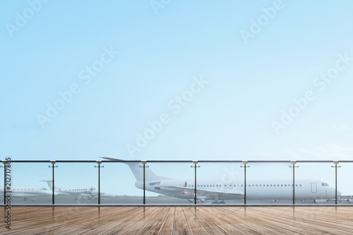 Airport terrace with wooden floor and airplane