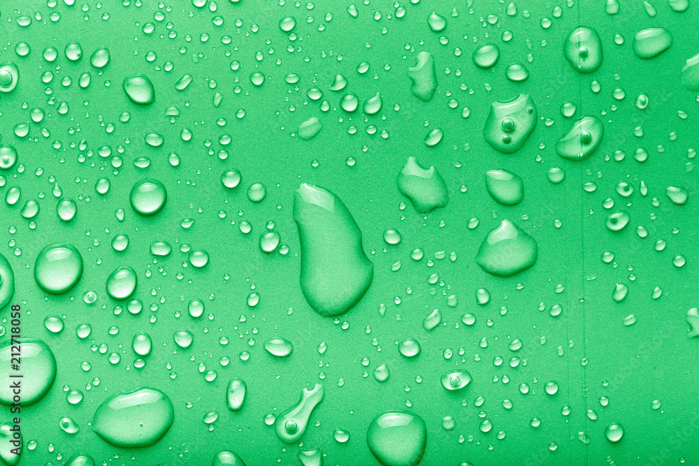 Drops of water on a color background. Green. Toned Drops of water on a color background. Green. Toned