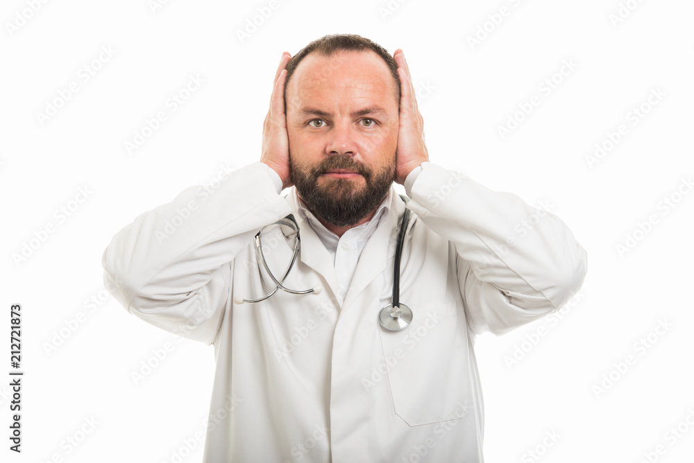 Portrait of male doctor showing covering ears gesture Portrait of male doctor showing covering ears gesture