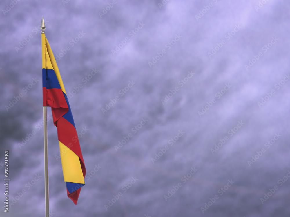 Fototapeta premium Flag of Colombia hanging down dangling