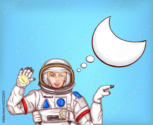 Vector astronaut girl in space suit waving her hand, sends a greeting and points finger off to side. Pop art concept illustration, woman cosmonaut with blank speech bubble on blue dotted background