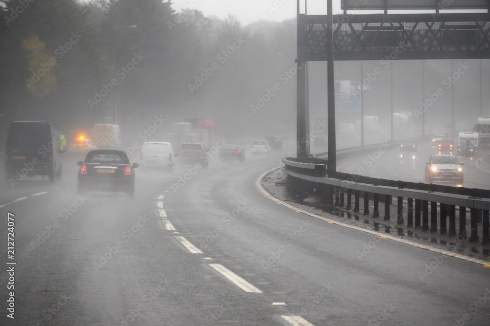 Obraz premium Driving on a motorway in a bad weather in England