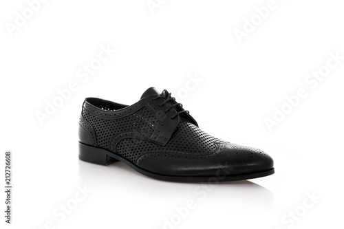 Close up of a black mens derby shoes on white background with reflection. Fashion advertising shoes photos.