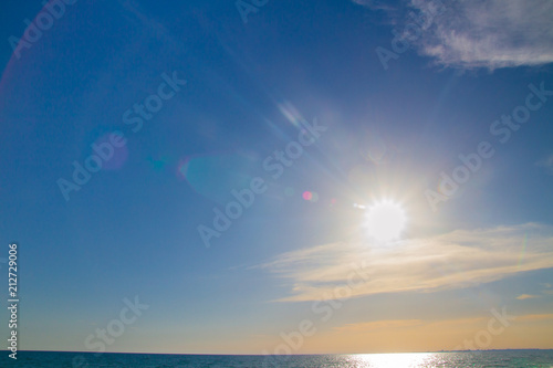 Beautiful summer sunset with clouds over the sea