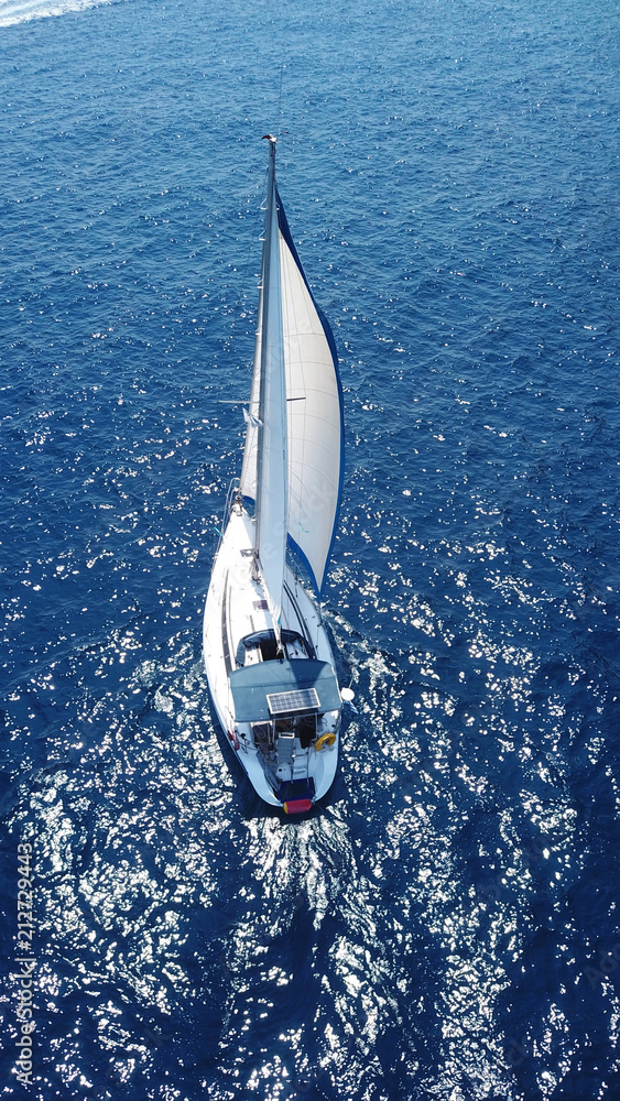 Aerial drone birds eye view of sail boat cruising the Aegean sea, Greece  Photos | Adobe Stock