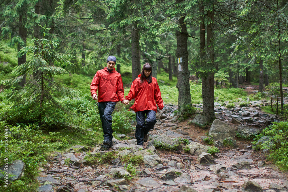 Young couple hiking in the highlands