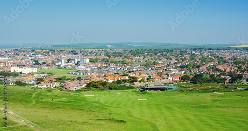 View of the town of Seaford from the cliff walk, houses, golf course, long photo Seaford Head, East Sussex, England, selective focus