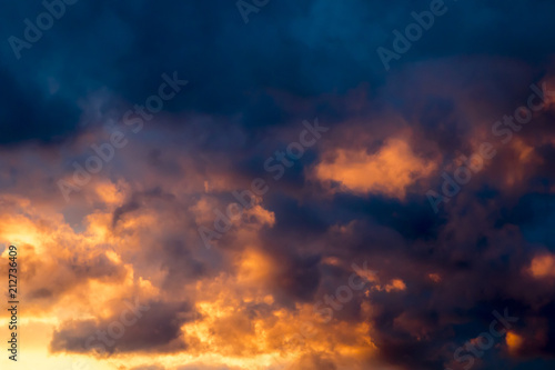 Storm clouds at sunset, dramatic sky