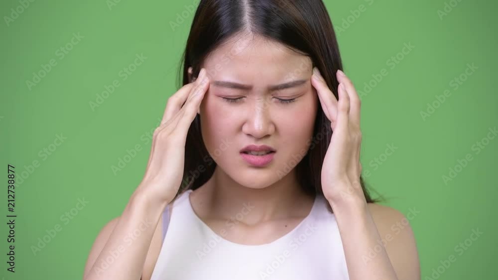 Young beautiful Asian businesswoman hav Young beautiful Asian businesswoman hav