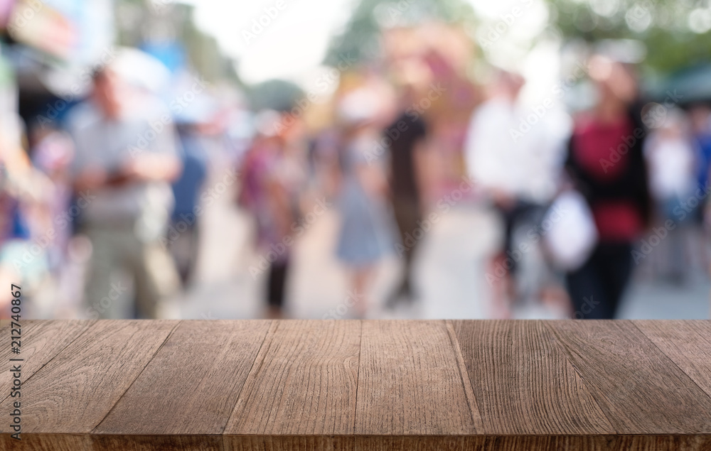 Empty dark wooden table in front of abstract blurred bokeh background of restaurant . can be used for display or montage your products.Mock up for space. Empty dark wooden table in front of abstract blurred bokeh background of restaurant . can be used for display or montage your products.Mock up for space.