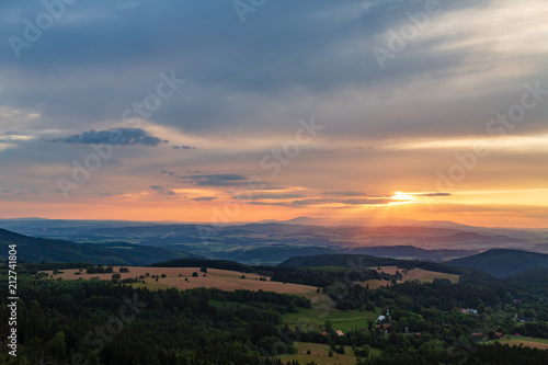 Summer sunset landscape green forest and mountains © blas
