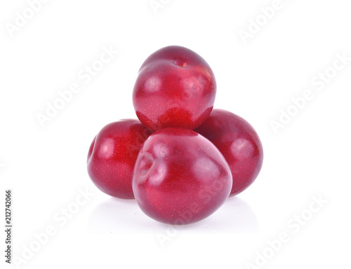 red cherry plums isolated on white background