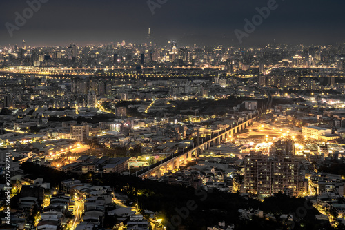 Aerial night view of Taipei City from Datongshan Mountain in Shulin, Taiwan.