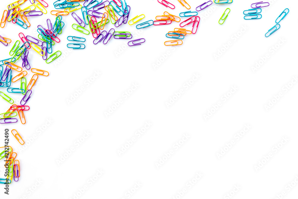 Fototapeta premium Colorful paper clips isolated on white background with copy space. Back to school concept