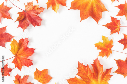 Autumn composition. Frame made of autumn maple leaves on white background. Flat lay  top view  copy space
