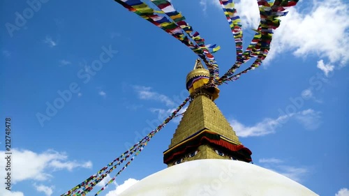 The dome of the Boudhanath Stupa, with prayer flags, Kathmandu, Nepal photo
