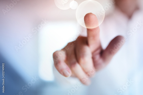 Person touches a point with his finger