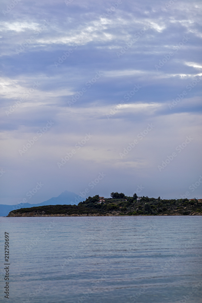The landscape with Mount Athos seen from the Sithonia Peninsula The landscape with Mount Athos seen from the Sithonia Peninsula