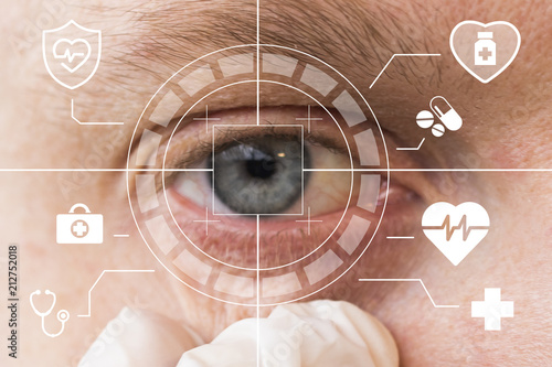 Future man with cyber technology treatment eye panel. Health eye concept.