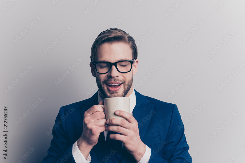 Face hands hold closed eyed coziness dream dreamy inspiration people person concept. Close up portrait of satisfied handsome funky peaceful calm marketer smelling green tea isolated on gray background Face hands hold closed eyed coziness dream dreamy inspiration people person concept. Close up portrait of satisfied handsome funky peaceful calm marketer smelling green tea isolated on gray background