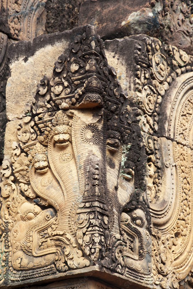Angkor Cambodia, carvings of naga on a corner block at the 10th century Banteay Srei temple Angkor Cambodia, carvings of naga on a corner block at the 10th century Banteay Srei temple