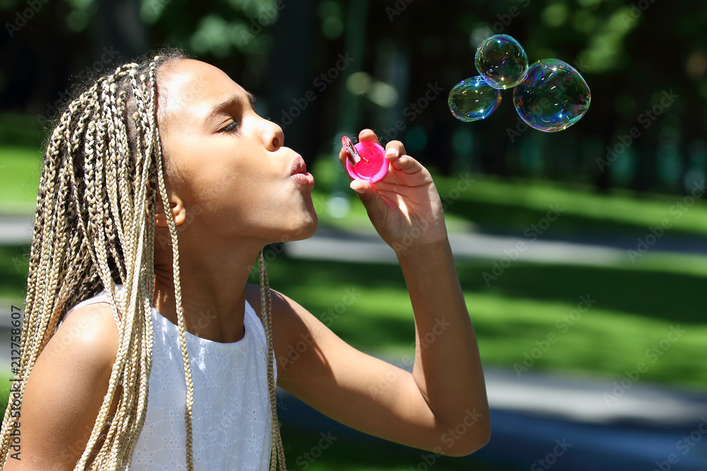 the girl with the long pigtails blow bubbles the girl with the long pigtails blow bubbles