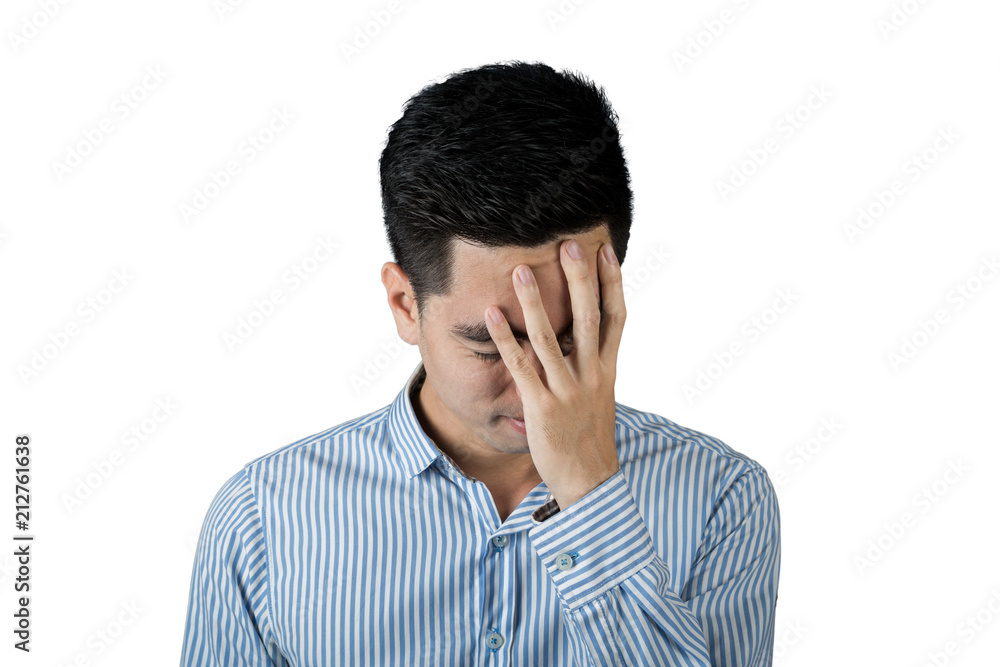 Close up stressed and anxiety handsome young asian man wearing a blue shirt isolated on gray wall background. Asia people. Close up stressed and anxiety handsome young asian man wearing a blue shirt isolated on gray wall background. Asia people.