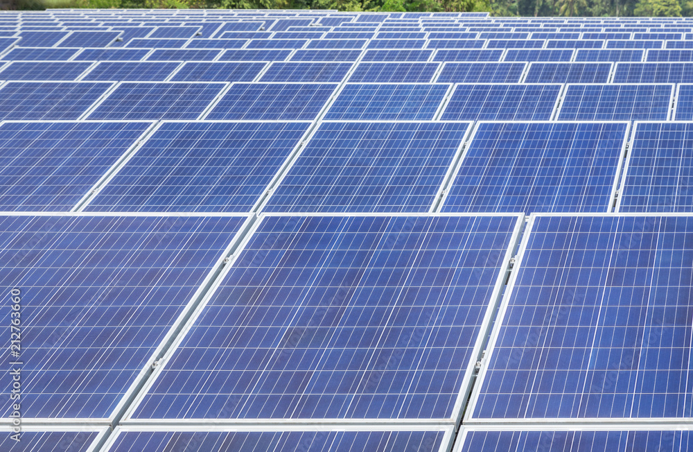 Close up rows array of polycrystalline silicon solar cells or photovoltaics in solar power plant Close up rows array of polycrystalline silicon solar cells or photovoltaics in solar power plant
