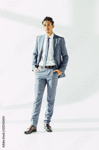 Fotografija Confidence African man in suit posing in studio