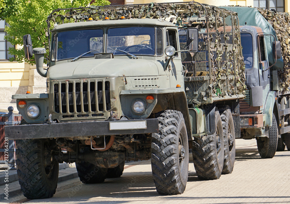 Military truck vehicle on the street Military truck vehicle on the street