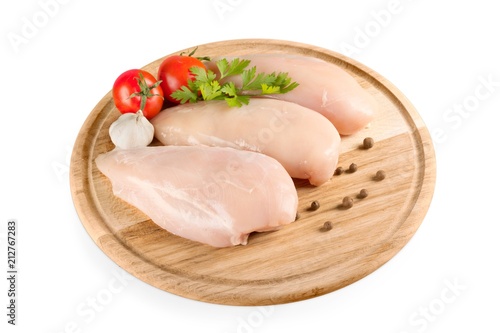 Raw Chicken brests on cutting board