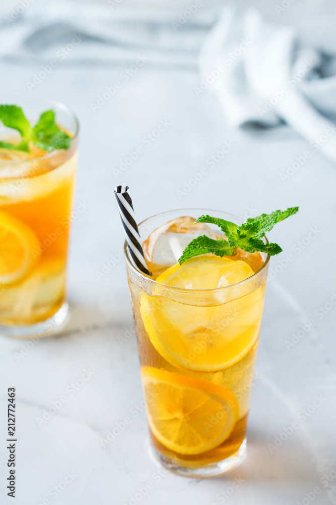 Lemon mint iced tea cocktail refreshing drink for summer days Lemon mint iced tea cocktail refreshing drink for summer days