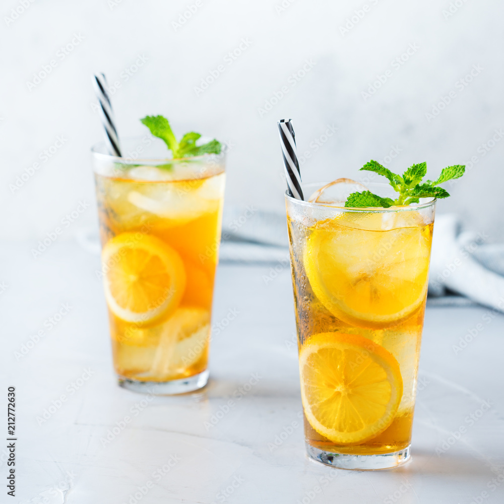 Lemon mint iced tea cocktail refreshing drink for summer days Lemon mint iced tea cocktail refreshing drink for summer days