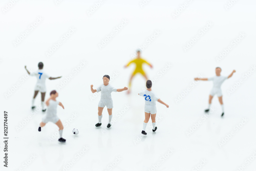 Miniature people : Football team image use for football of the year, world cup , sport concept. Miniature people : Football team image use for football of the year, world cup , sport concept.