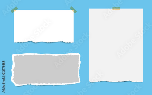 Blank squared notepad pages and tape. Note paper stuck with beige sticky tape.