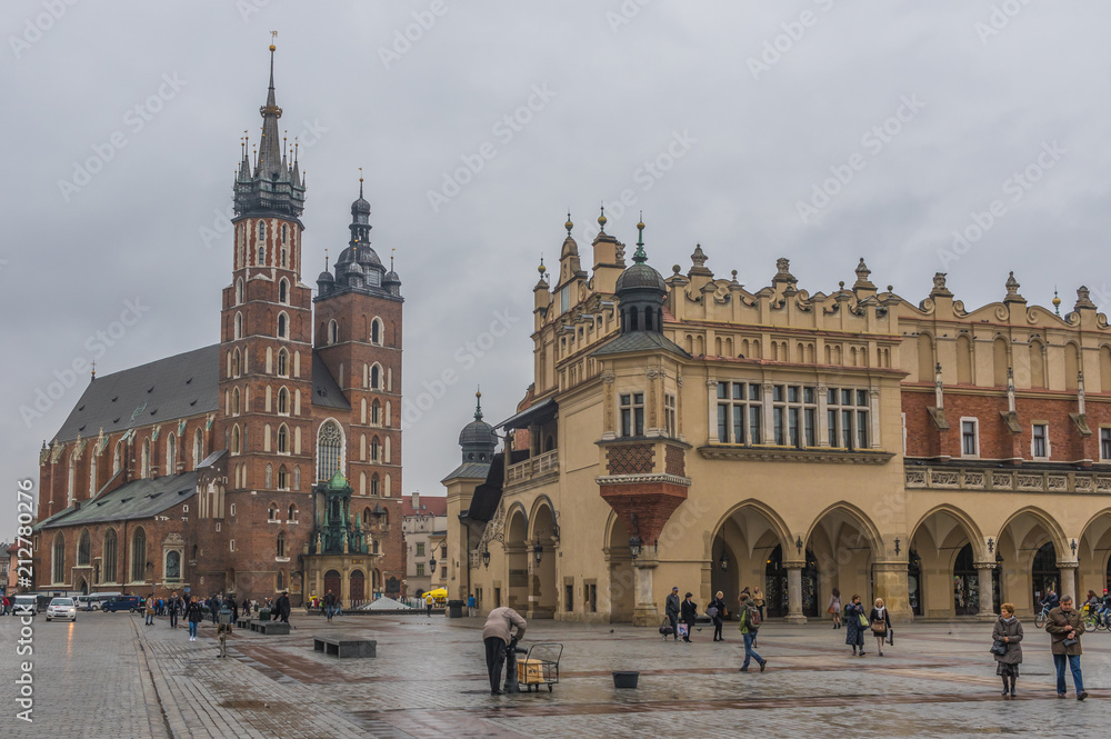 Naklejka premium Krakow, Poland - the second biggest city in Poland, Krakow offers a mix of history and modernity. Here in the picture a perspective of the Old Town and the main square