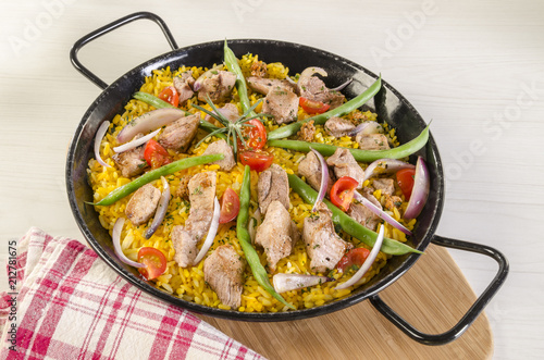 Pork Paella Spanish style of meat and rice combination casserole