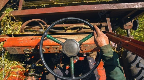 Tractor Steering.selective focus.soft focus the field for background. photo