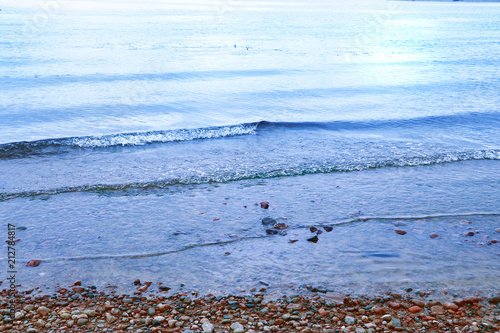 blue waves roll to shore