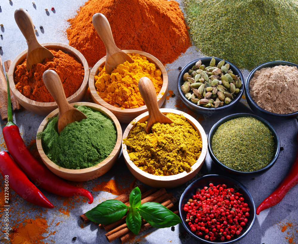Variety of spices on kitchen table Variety of spices on kitchen table