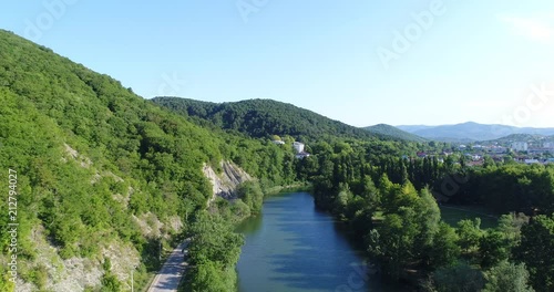 Wallpaper Mural Calm river, forest and green hill. Aerial photography, panorama of the river. Torontodigital.ca