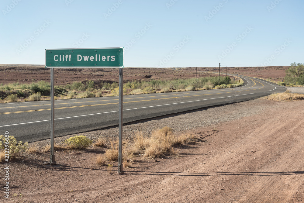 Solitary desert highway. Old asphalt road in a hot location