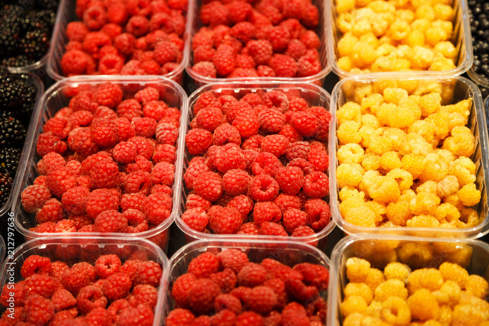 Colourful mix of different fresh berries at market Colourful mix of different fresh berries at market