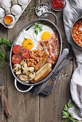 Traditional Full English Breakfast. Rustic style photography. Overhead 
